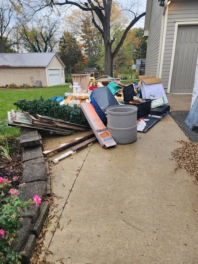 Dumpster being loaded with debris for Residential Dumpster Rental in Ahoskie